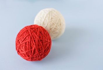 Red and white wool ball for knitting