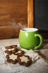 Morning coffee with some star-shaped chocolate cookies