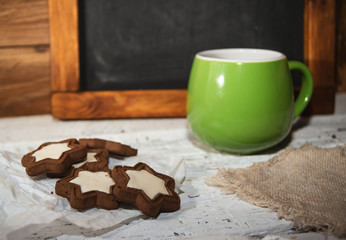 Morning coffee with some star-shaped chocolate cookies