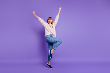 Fototapeta na wymiar Full length body size view portrait of nice-looking attractive lovely cheerful cheery straight-haired lady having fun raising hands up isolated on bright vivid shine violet purple background