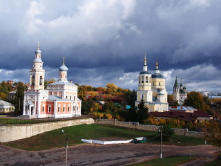Church in the autumn landscape of the city. The Church dome surrounded by beautiful autumn trees. ...