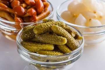pickled vegetables on a white acrylic background