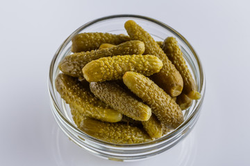 pickled vegetables on a white acrylic background