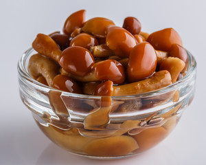 pickled vegetables on a white acrylic background