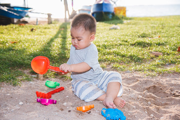 Baby child playing lifestyle sand