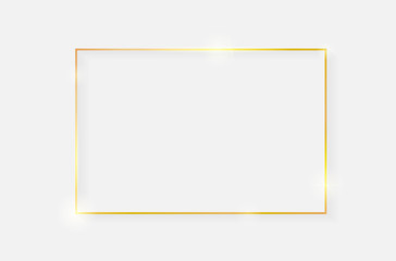 Gold shiny glowing vintage frame with shadows isolated on white background. Golden luxury realistic rectangle border. Vector