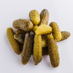 pickled vegetables on a white acrylic background