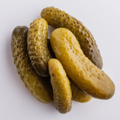 pickled vegetables on a white acrylic background