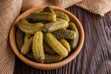 pickled vegetables on a wooden rustic background