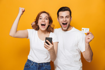 Portrait of a cheerful young couple standing