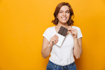 Portrait of a happy lovely girl standing isolated