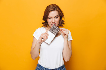 Portrait of a happy lovely girl standing isolated