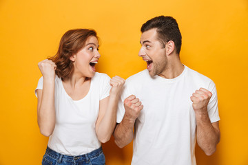 Portrait of a cheerful young couple standing