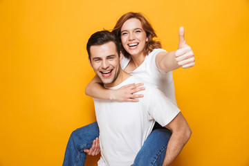 Portrait of a cheerful young couple standing