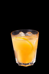 Summer yellow cocktail on isolated black background
