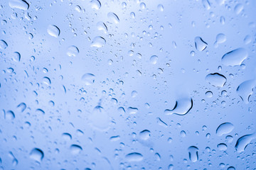 Picture Inside of water rain drops on car window glass