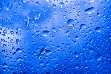 Picture Inside of water rain drops on car window glass