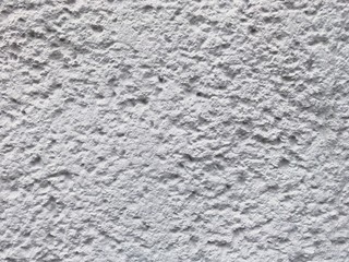 Rough bumpy white concrete texture background.