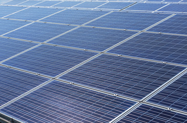Close up  solar cells or photovoltaics in solar power station alternative clean renewable energy...