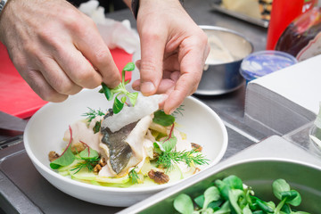 Salad with green apple, walnuts, honey sauce and basil, an exclusive dish from the Italian chef