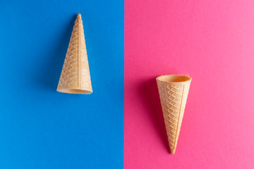 Ice cream cornet on blue and pink background