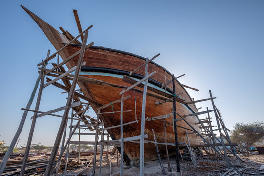 Traditional dhow boat of Qeshm Island, Iran, in construction at the dock