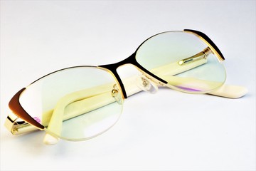 Glasses for vision correction on a white background. Glasses are a common optical device designed to improve a person's poor vision.