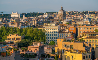 Panorama from the Gianicolo Terrace with the dome of Sant'Andrea della Valle and Santissima Trinità dei Pellegrini church in Rome, Italy.