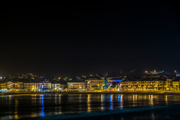 Fototapeta na wymiar night view of the promenade of the small tourist town of Panxon (Nigran - Pontevedra)