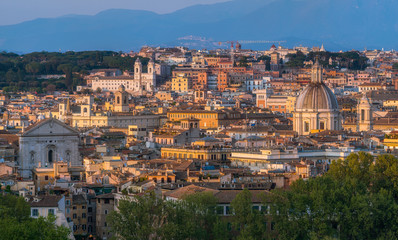 Fototapeta na wymiar Late afternoon panorama with Trinità dei Monti from the Gianicolo Terrace in Rome, Italy.