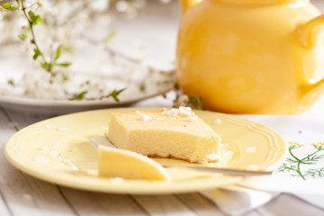 Cheesecake decorated with edible white petals
