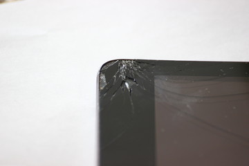broken screen of mobile phone or tablet. modern technologies in human life. to repair the...