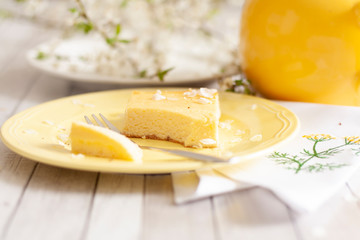 Cheesecake decorated with edible white petals