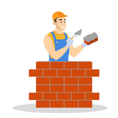 Man building brick wall. Construction worker in a uniform