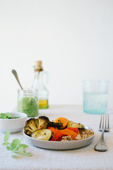 Still life of summer lunch or dinner. Plate with roasted vegetables