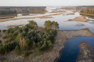Spring river aerial view. Flood on floodplain at springtime