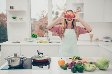 Close up photo beautiful funky she her lady adore cooking housewife done preparations delicious dish family dinner hide eyes red fresh tomatoes wear domestic apron shirt bright home kitchen indoors