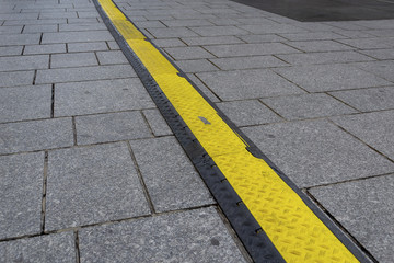 Passage de câbles sur voiries en pavés de rue