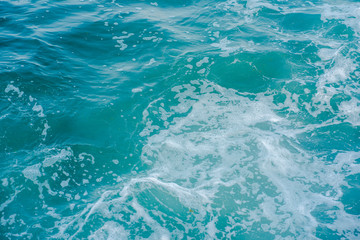 Fototapeta premium Sea water with waves and foam.