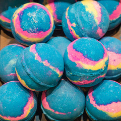 Shop cosmetic handmade bombs and bubble bath different colors. The concept of Spa and relaxation