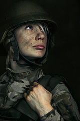 Portrait of young female soldier