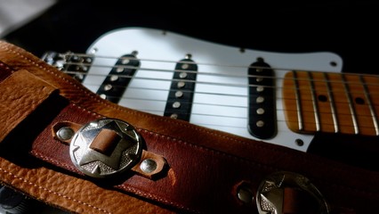 electric guitar and guitar straps . closeup