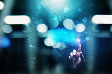 Mixed media. Business Organisational structure on virtual screen with process icons.