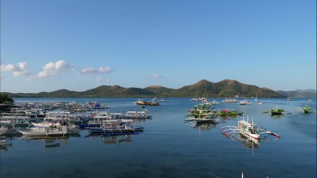 Traditional  banga boats at port of Coron, Philippines, time lapse