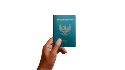 Close up hand holding indonesian passport isolated on white background - Image