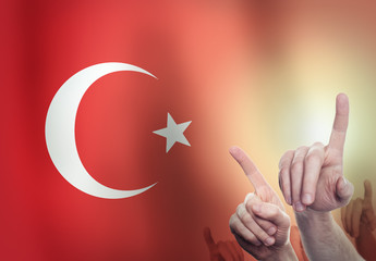 Hands on the background of the Turkey flag. Freedom concept