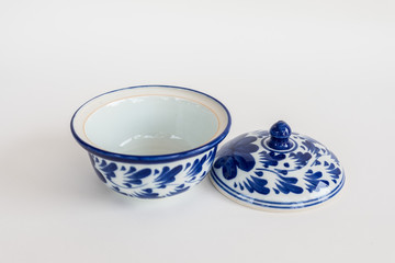 Porcelain white pottery bowl draw a leaf blue pattern with lid art style asian on white background isolated