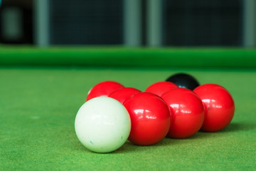 Close up snooker ball on the green snooker table.