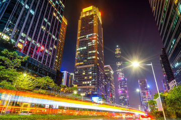 Fototapeta premium Road City Nightscape Architecture and Fuzzy Car Lights..