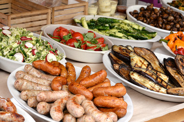 grilled sausages and vegetables